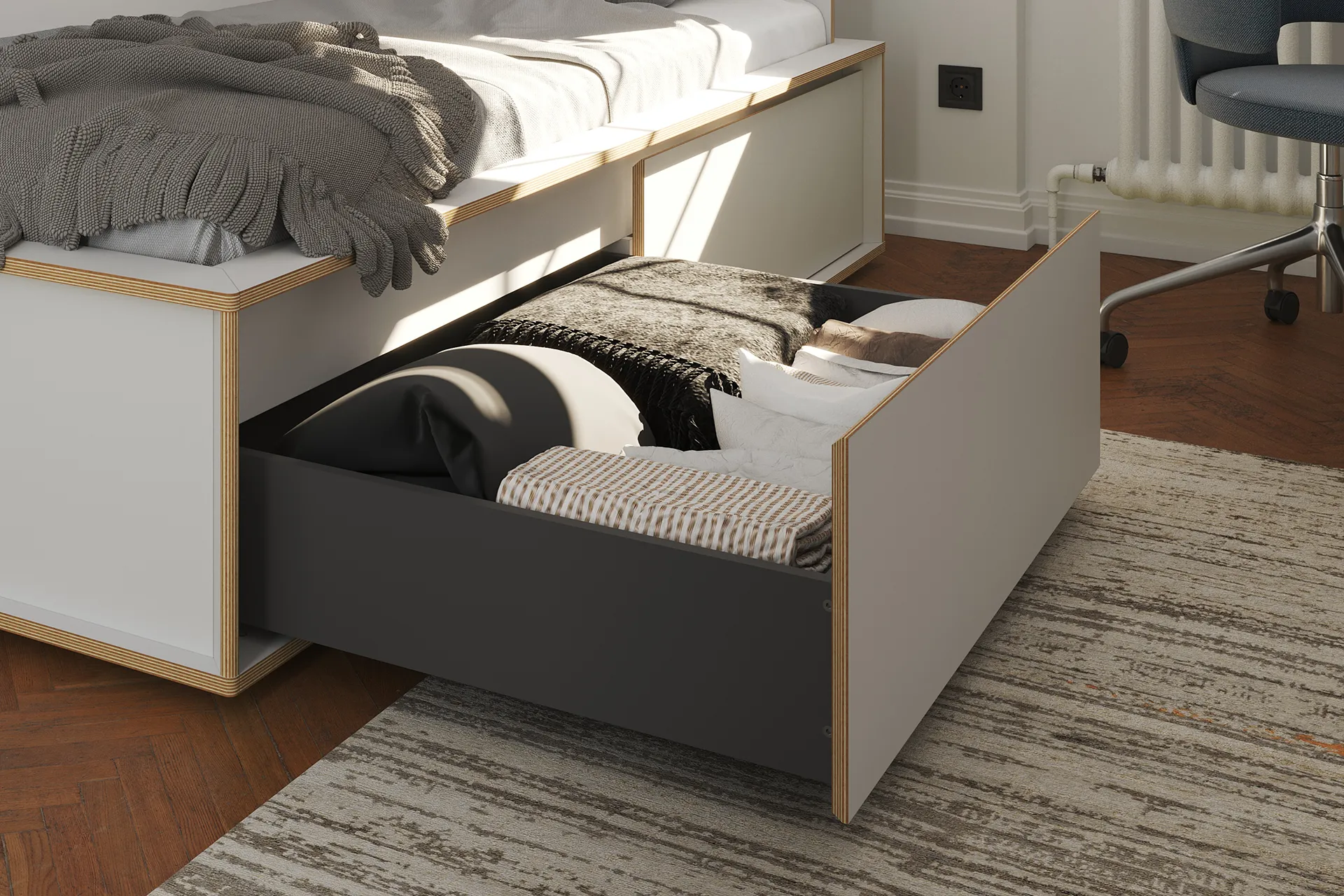 SPAZE bed white with open drawer full of bedding